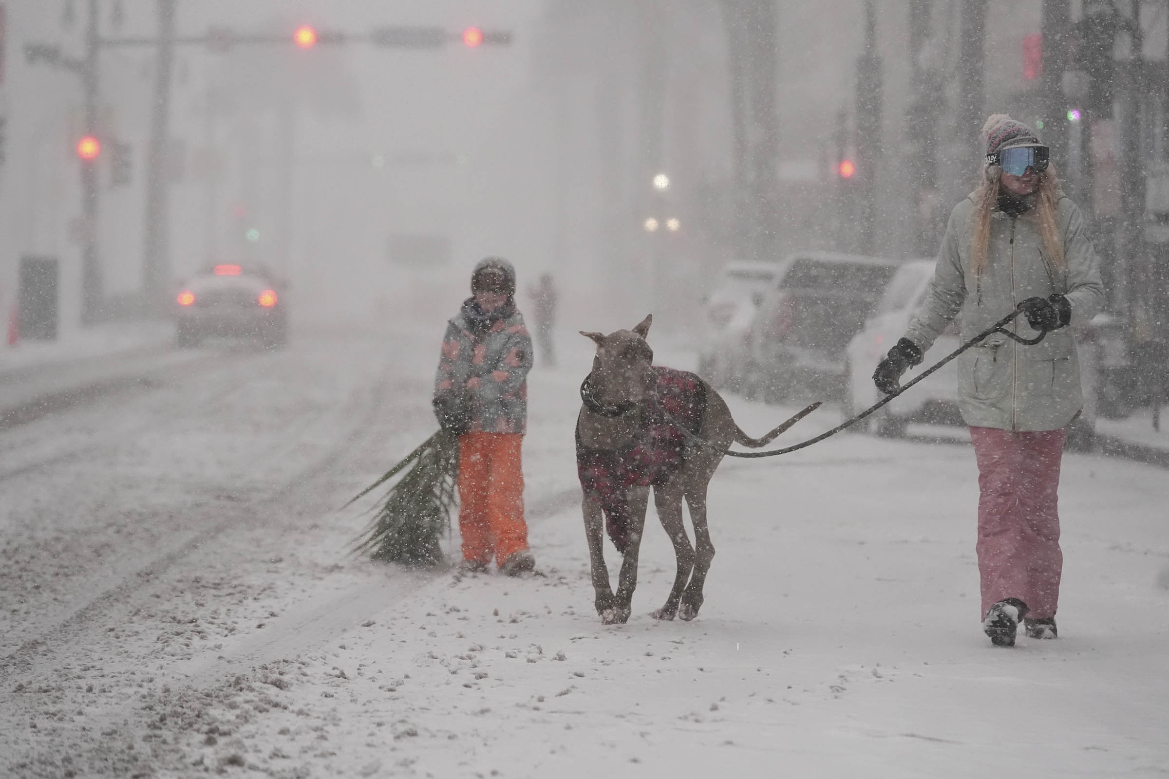 Winter storm that dropped record-breaking snow in New Orleans spreads into Florida and the Carolinas