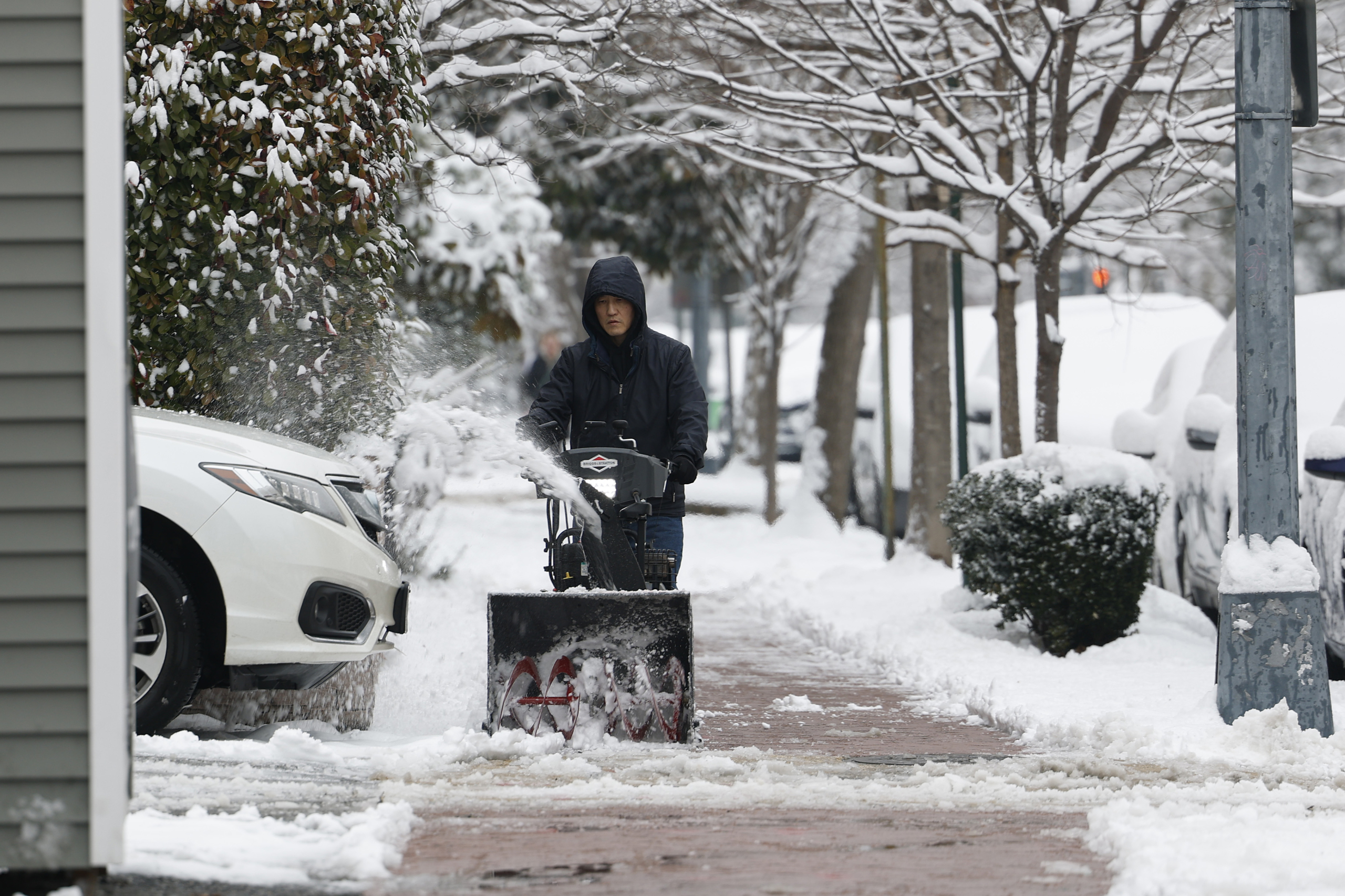 Winter-weary East Coast hit with another storm as temperatures plunge elsewhere