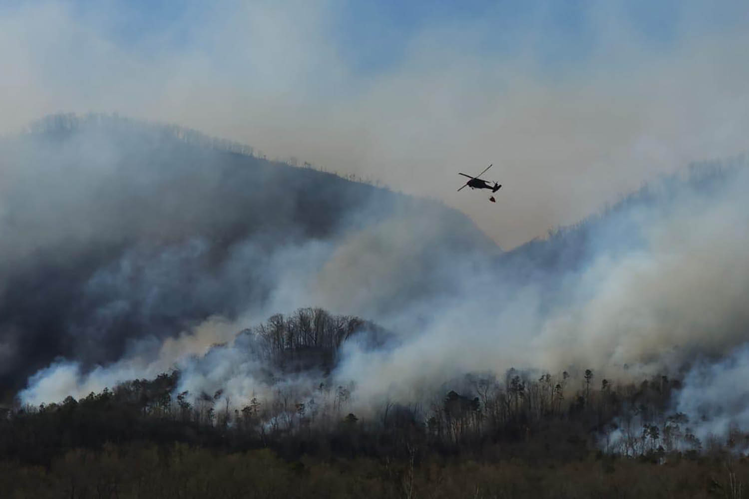 Wildfires in North and South Carolina fueled by drought, wind and fallen trees from Hurricane Helene