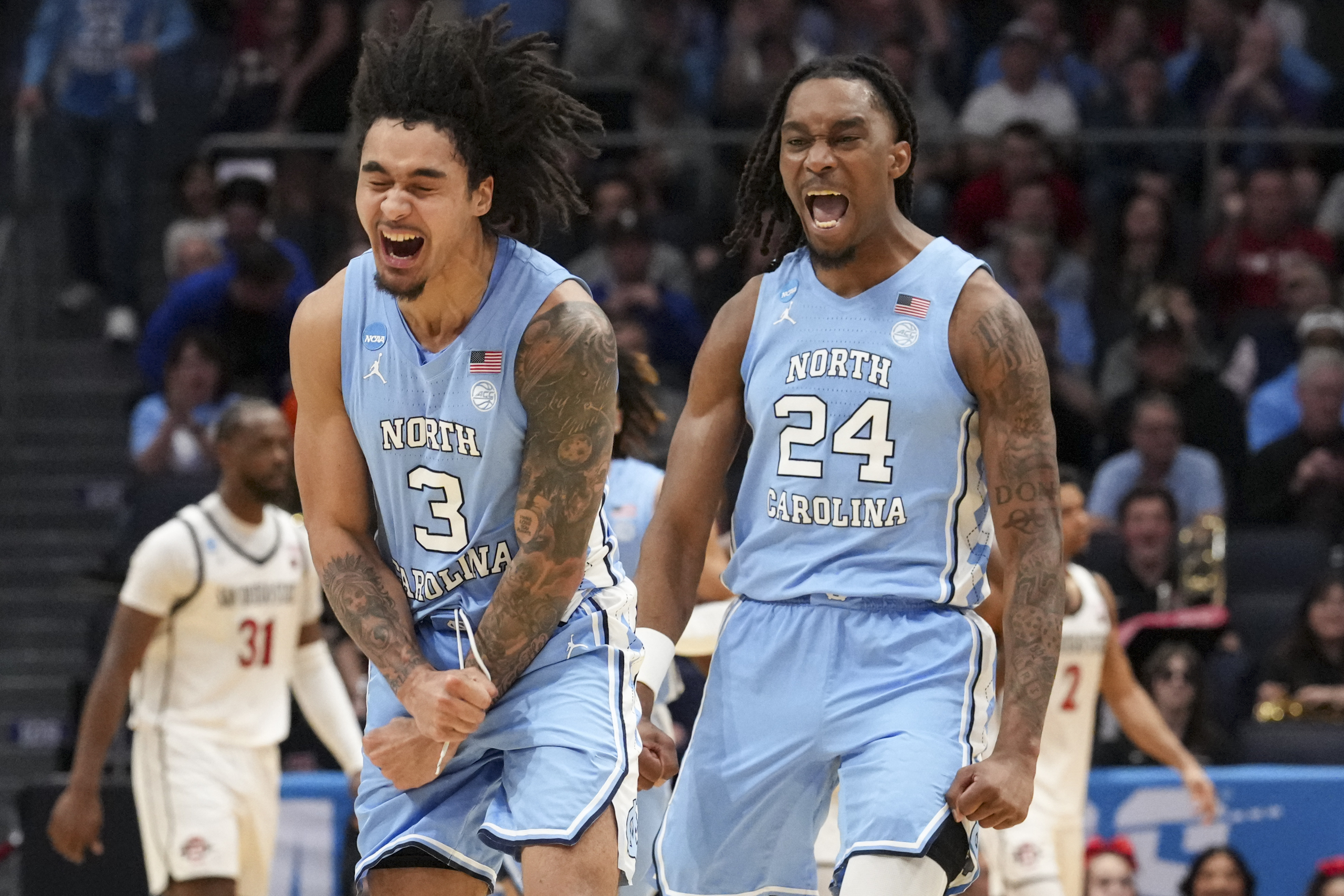 Davis perfect on six 3s as North Carolina routs San Diego State 95-68 in First Four