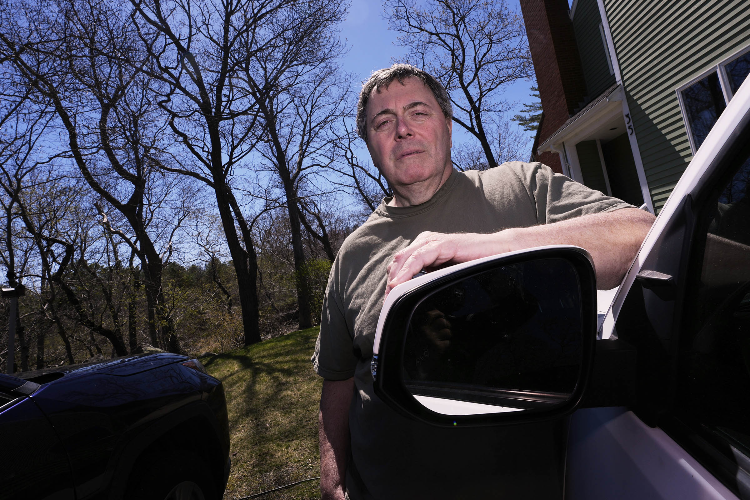 A woodpecker has invaded a Massachusetts neighborhood. Residents are taking it in stride