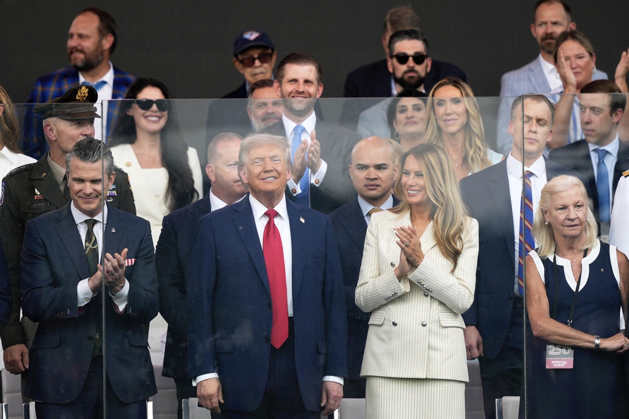 Military parade rolls through DC as ‘No Kings’ protesters across US decry Trump